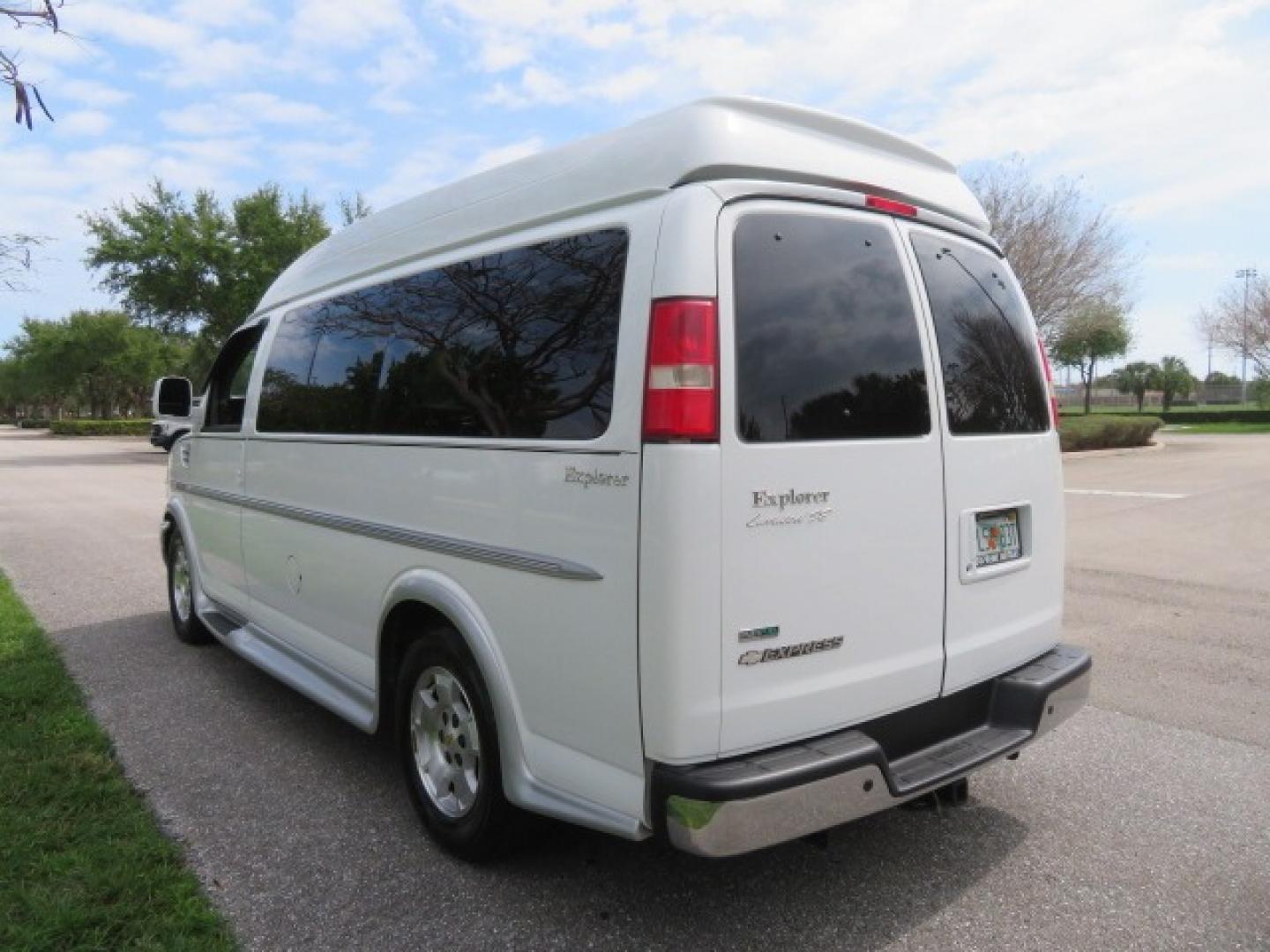 2010 White /Gray Chevrolet Express (1GNUGCD48A1) , located at 4301 Oak Circle #19, Boca Raton, FL, 33431, (954) 561-2499, 26.388861, -80.084038 - You are looking at a Gorgeous 2010 Chevy Express Handicap Wheelchair Conversion Van Explorer Limited SE with 31K Original Miles, Braun Century 750lb Side Entry Wheelchair lift, Tie Down System in the Floor, Rear Entertainment with Flat Screen TV/DVD, Leather Interior, Rear Power Folding Bench Seat/b - Photo#15